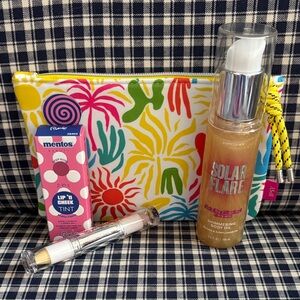 Rude lip and cheek tint with Ipsy Colorful  Pouch carmindy concealer and body oi